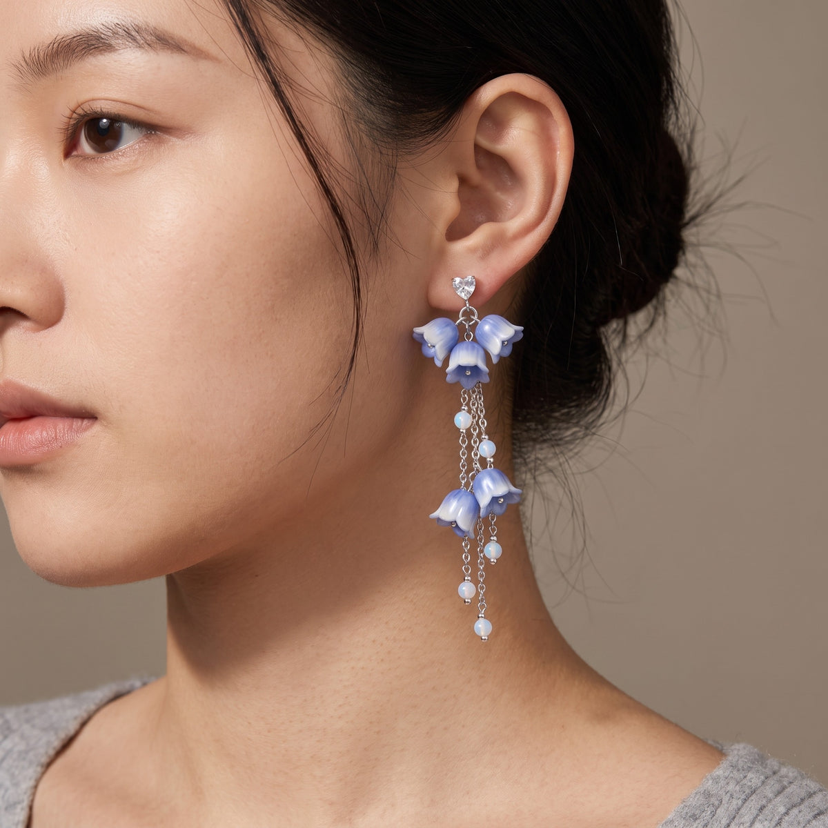 Bluebell Earrings worn on the ear
