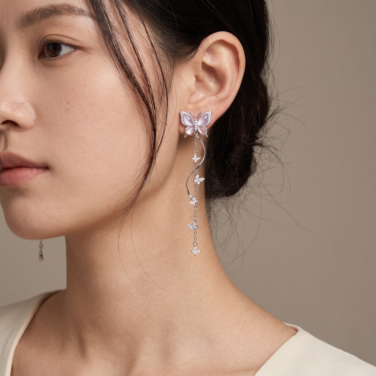 Nabi Earrings, Lilac worn on the ear