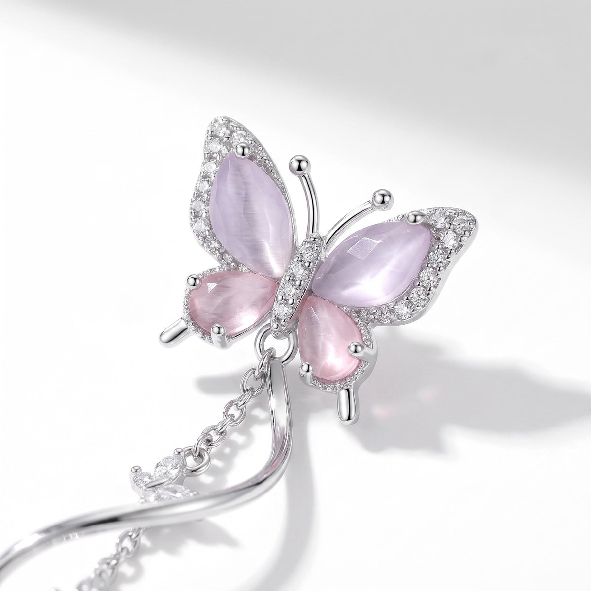 Close detail of the lilac butterfly and twisting stem