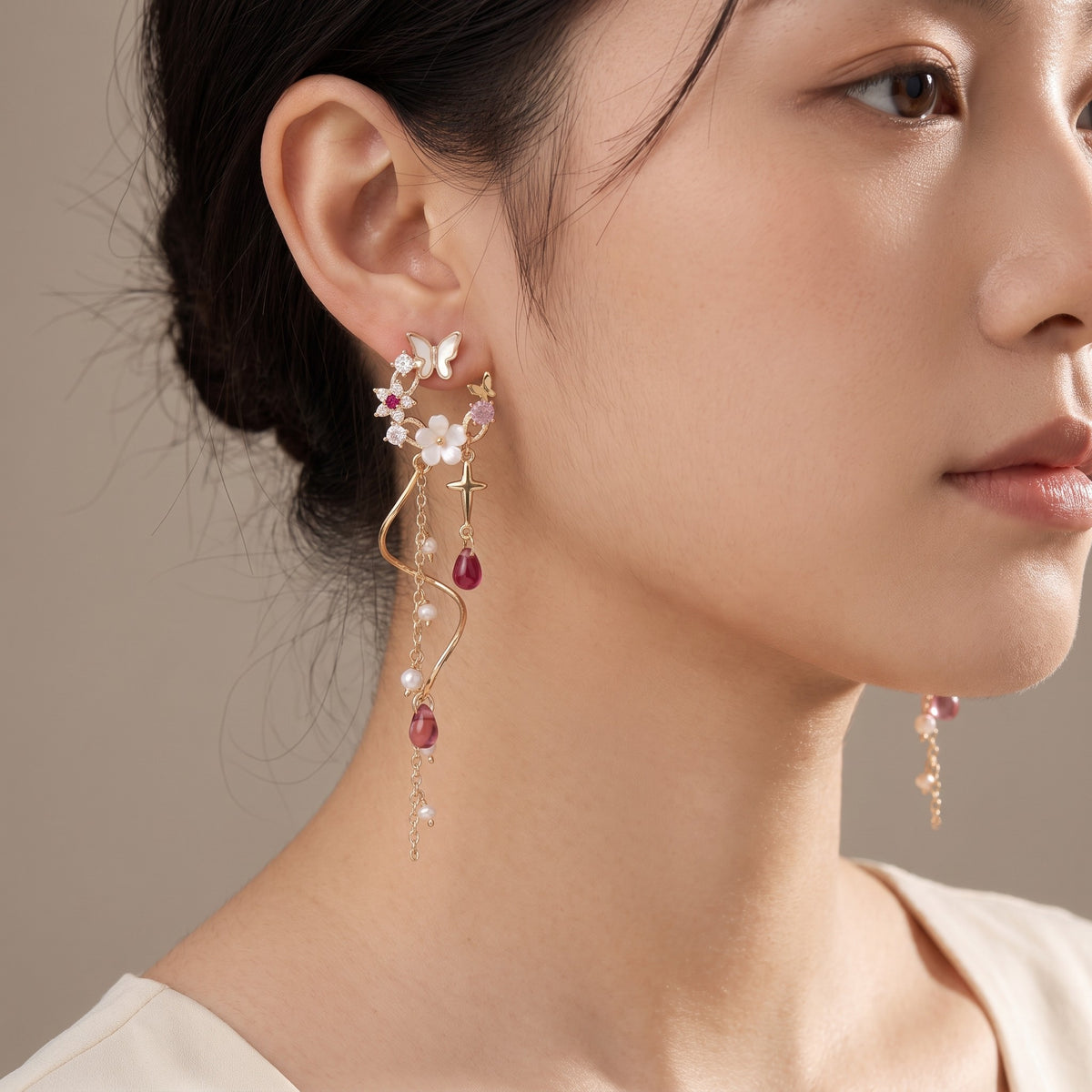 Starfall Earrings worn on the ear
