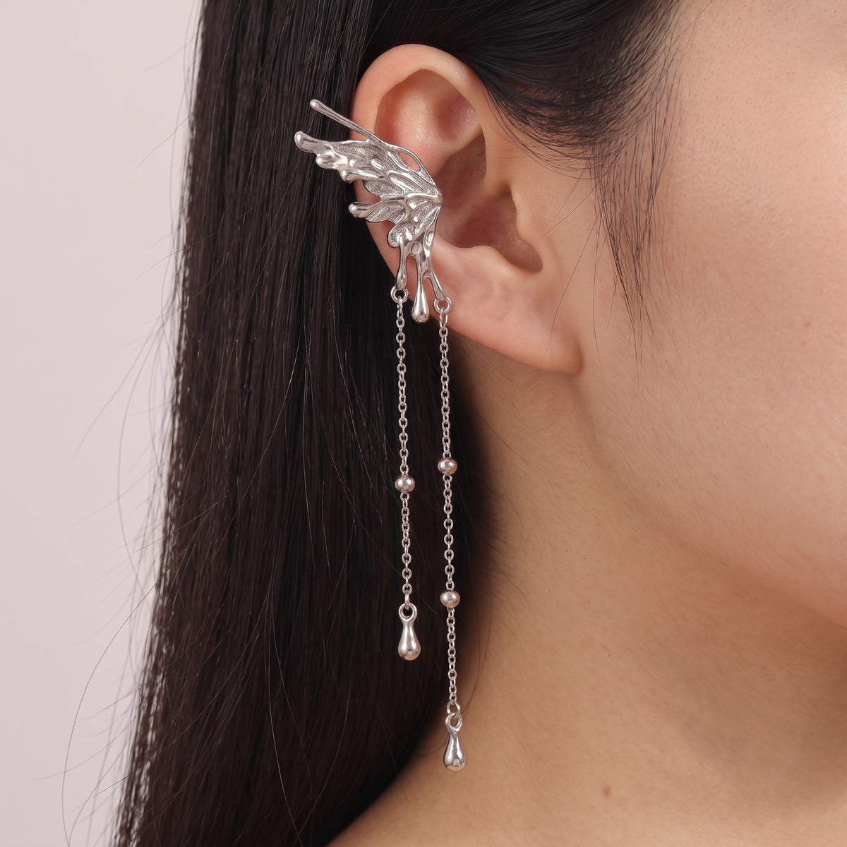 Seraph Earrings worn over the upper ear