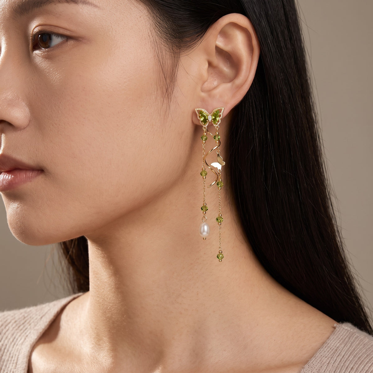 Nabi Earrings, Fern worn on the ear