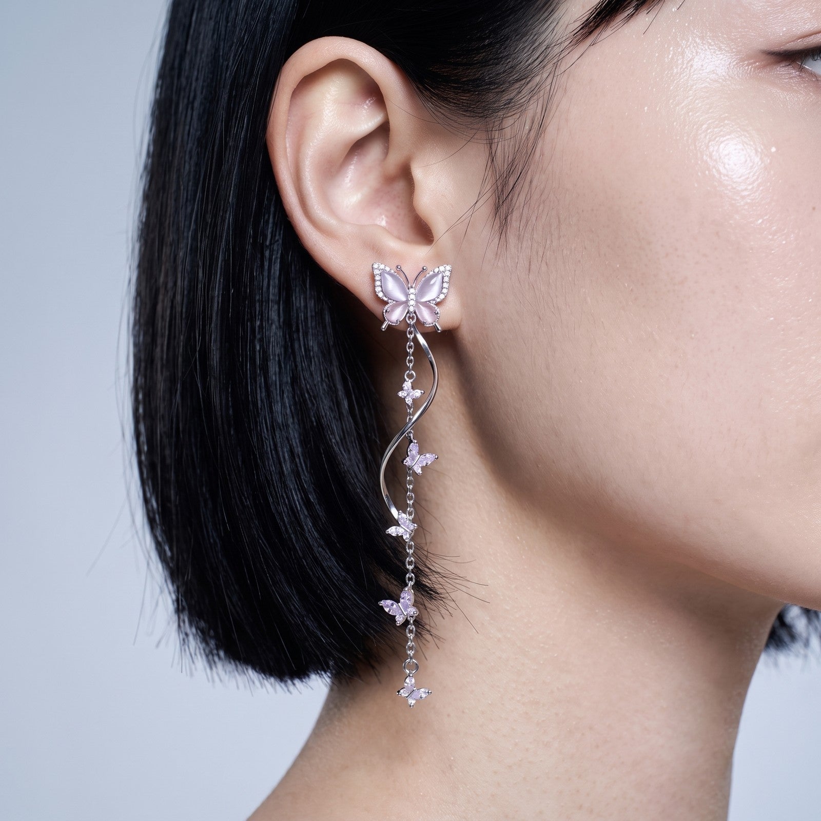 The Starfall Earrings worn, photographed close to the neck