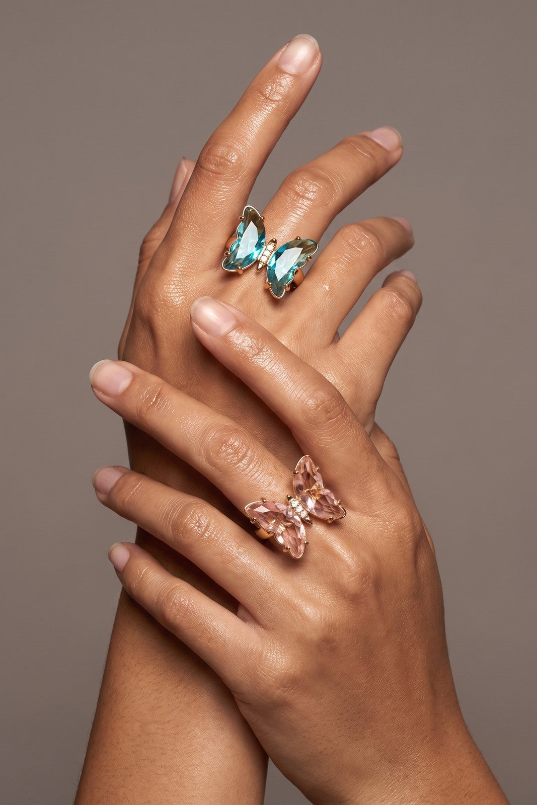A model wearing the Nabi Ring in aurora, by a window