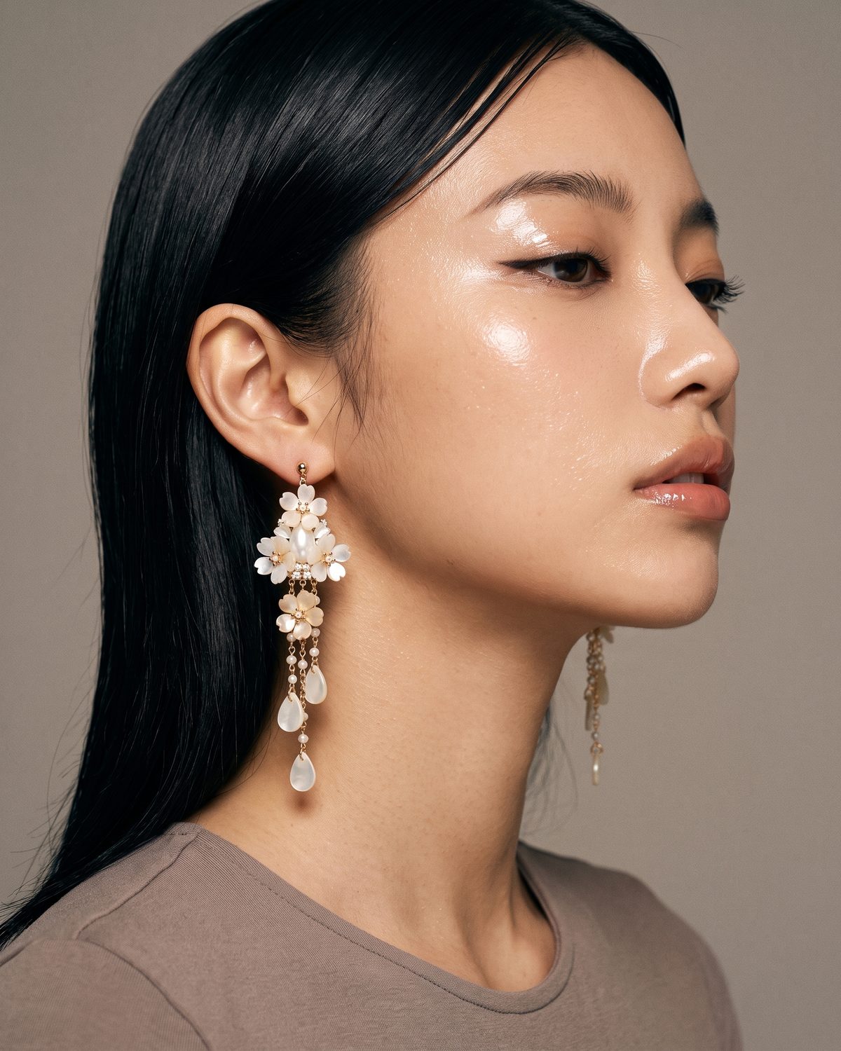 The Moonpetal Earrings worn, seen from the side